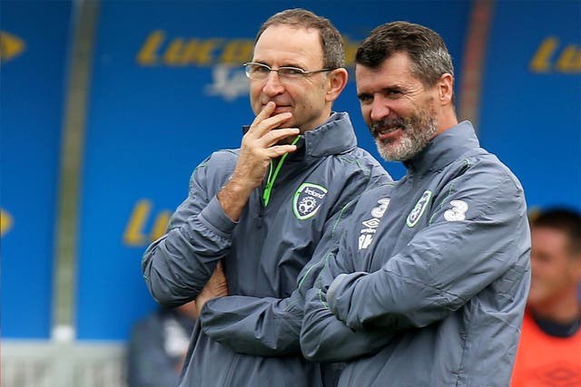 Martin O'Neill manages to elicit a rare smile from his assistant Roy Keane
