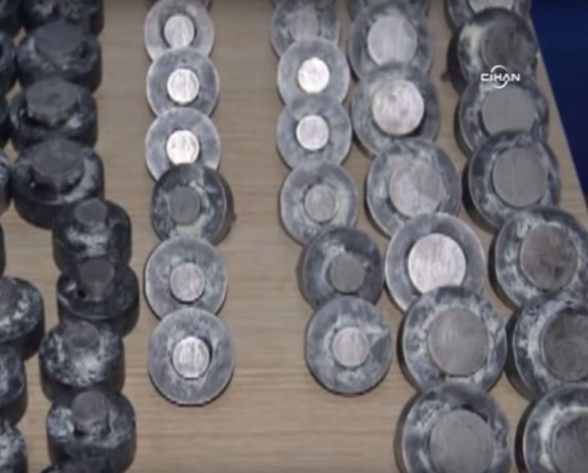 The equipment used by the men to make Isis' currency