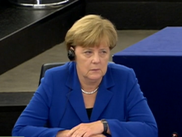 German Chancellor Angela Merkel listening to Ukip leader Nigel Farage