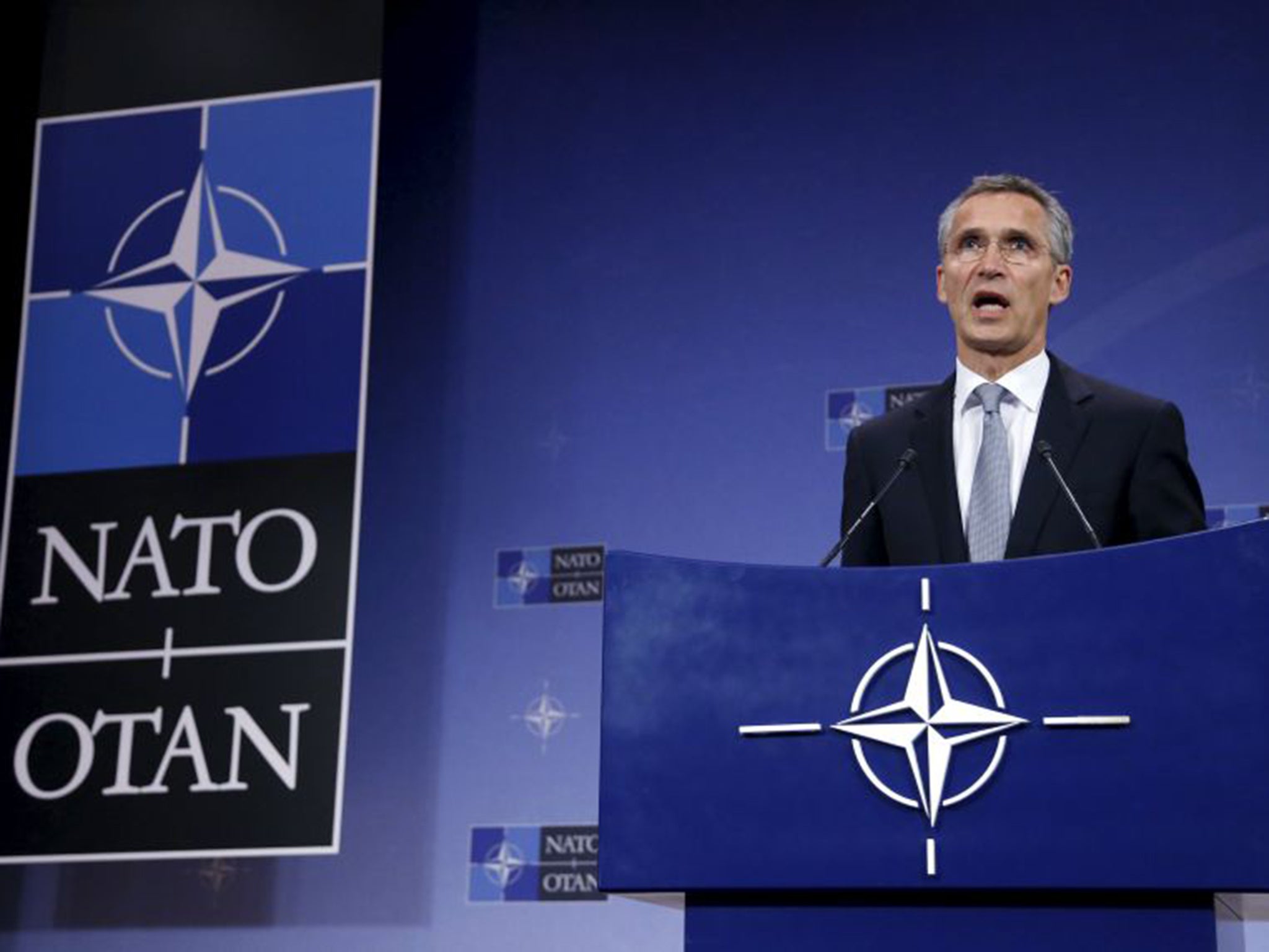NATO Secretary General Jens Stoltenberg addresses a news conference on Thursday. NATO has said it is prepared to send troops to Turkey to defend its ally after violations of Turkish airspace by Russian jets bombing Syria