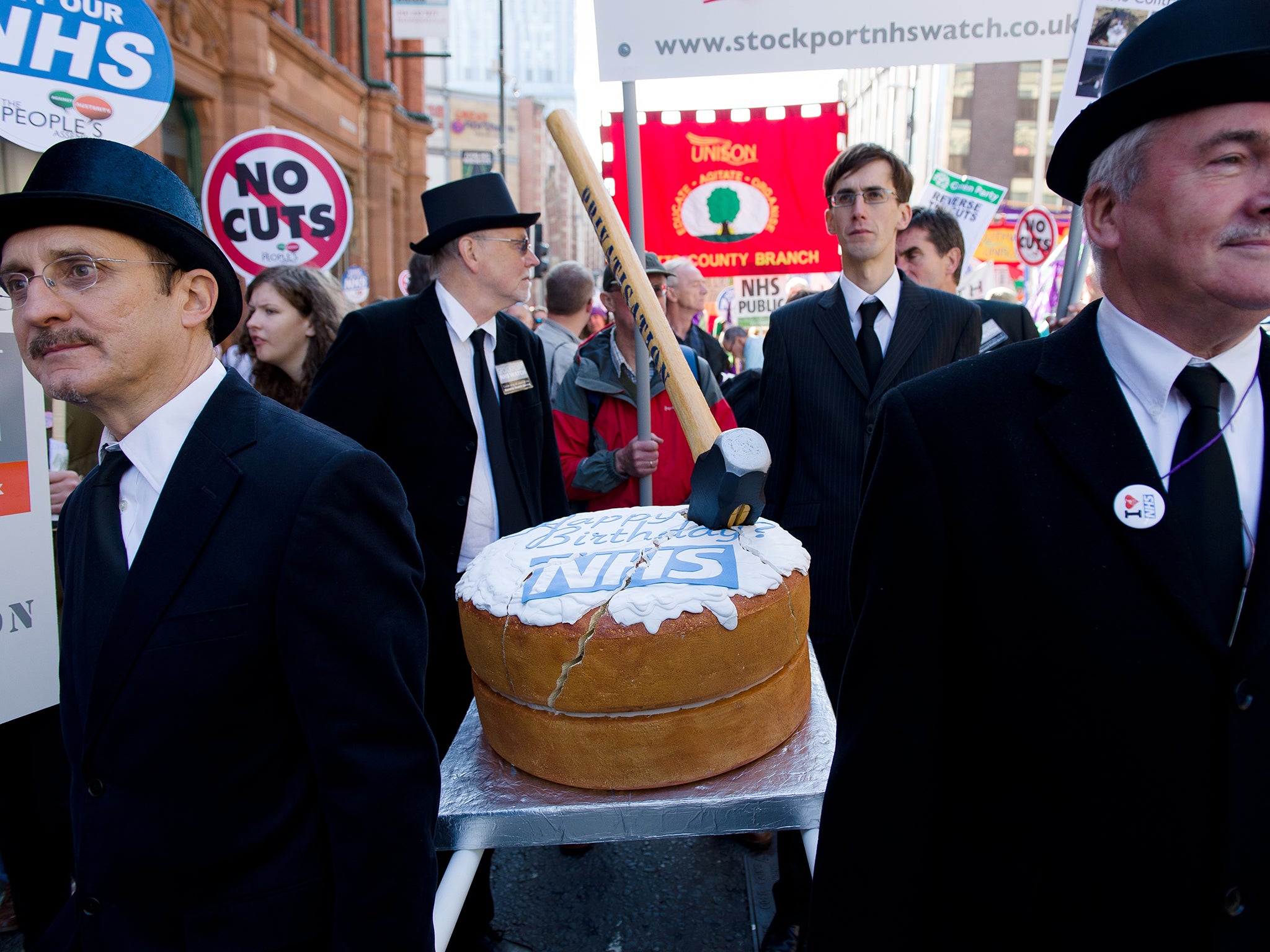 Protesters during a march in support of the NHS and against proposed cuts and privatisation in Manchester in 2013