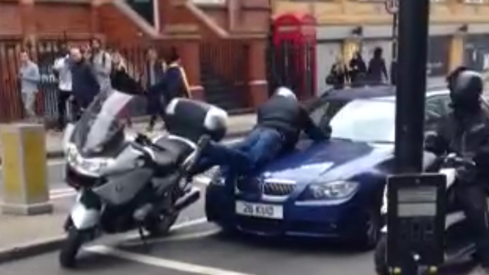 Road rage video shows motorcyclist damage vehicle during London rush hour