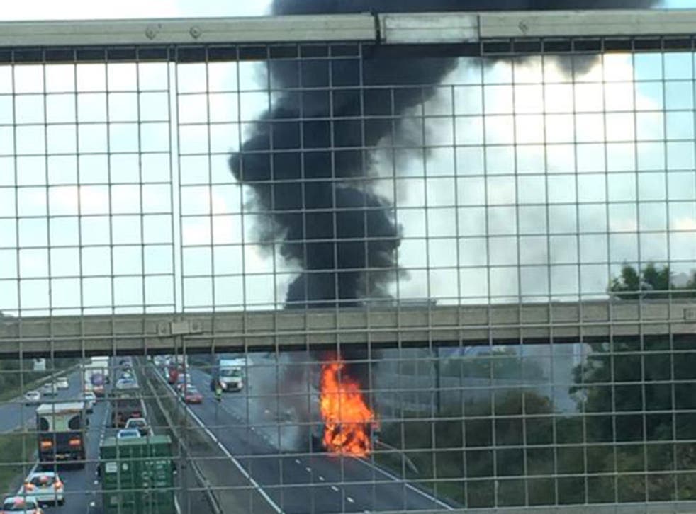 Passers-by photographed the fire from a bridge over the A14