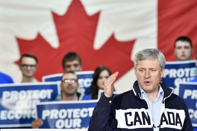 Conservative leader Stephen Harper speaks at a rally during a campaign stop in Bay Robert's