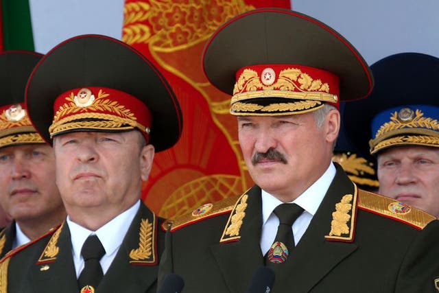 President for 21 years, Alexander Lukashenko, right, is the election favourite