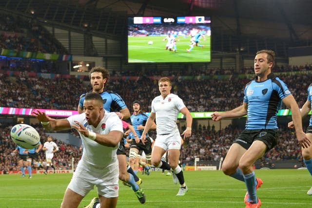 Anthony Watson scores an try for England against Uruguay