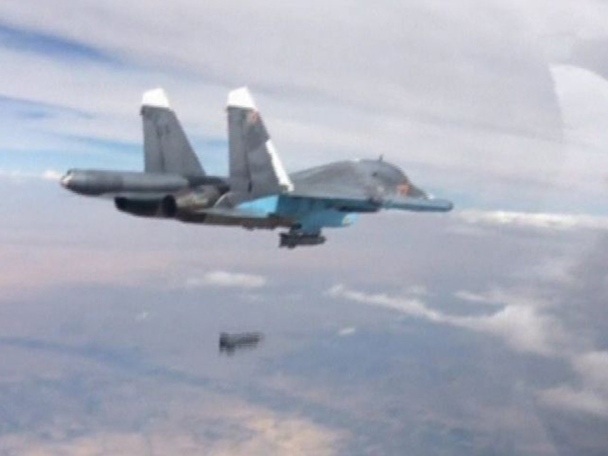 Footage showing a Russian SU-34 fighter-bomber dropping a bomb over Syria on Friday, part of an airstrike that hit 60 targets