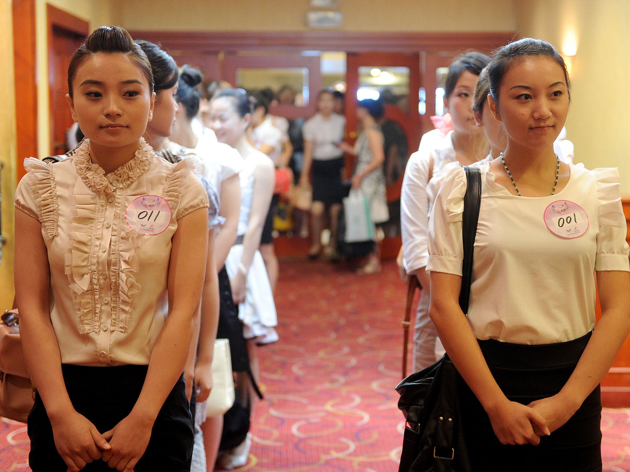 Chinese women queue to be interviewed as flight attendants