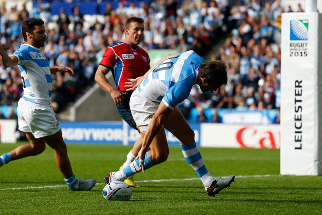 Juan Martin Hernandez scores the opening try for Argentina against Namibia