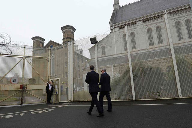 The walkout at Wormwood Scrubs will place renewed focus on the Government's prison reforms