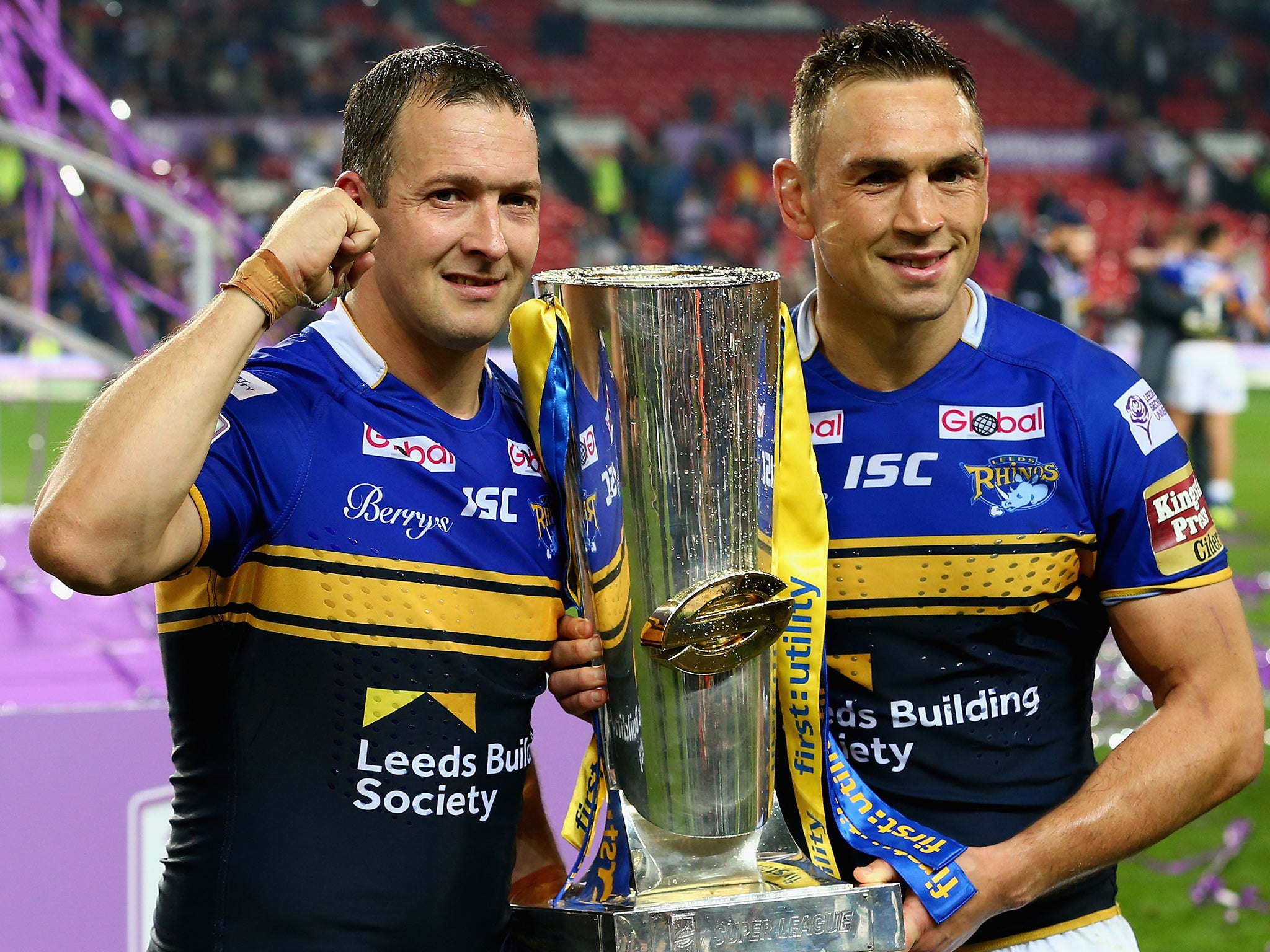 Man of the match Danny McGuire (left) and Kevin Sinfield with the trophy