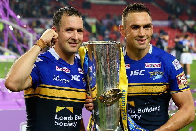 Man of the match Danny McGuire (left) and Kevin Sinfield with the trophy