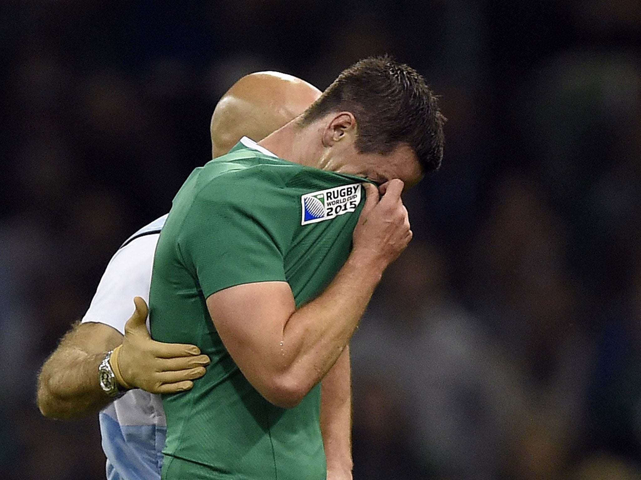 Jonathan Sexton wipes away tears as he leaves the field during Ireland's win over France