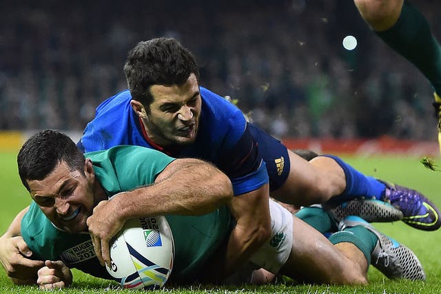 Rob Kearney slides over to score Ireland's first try against France