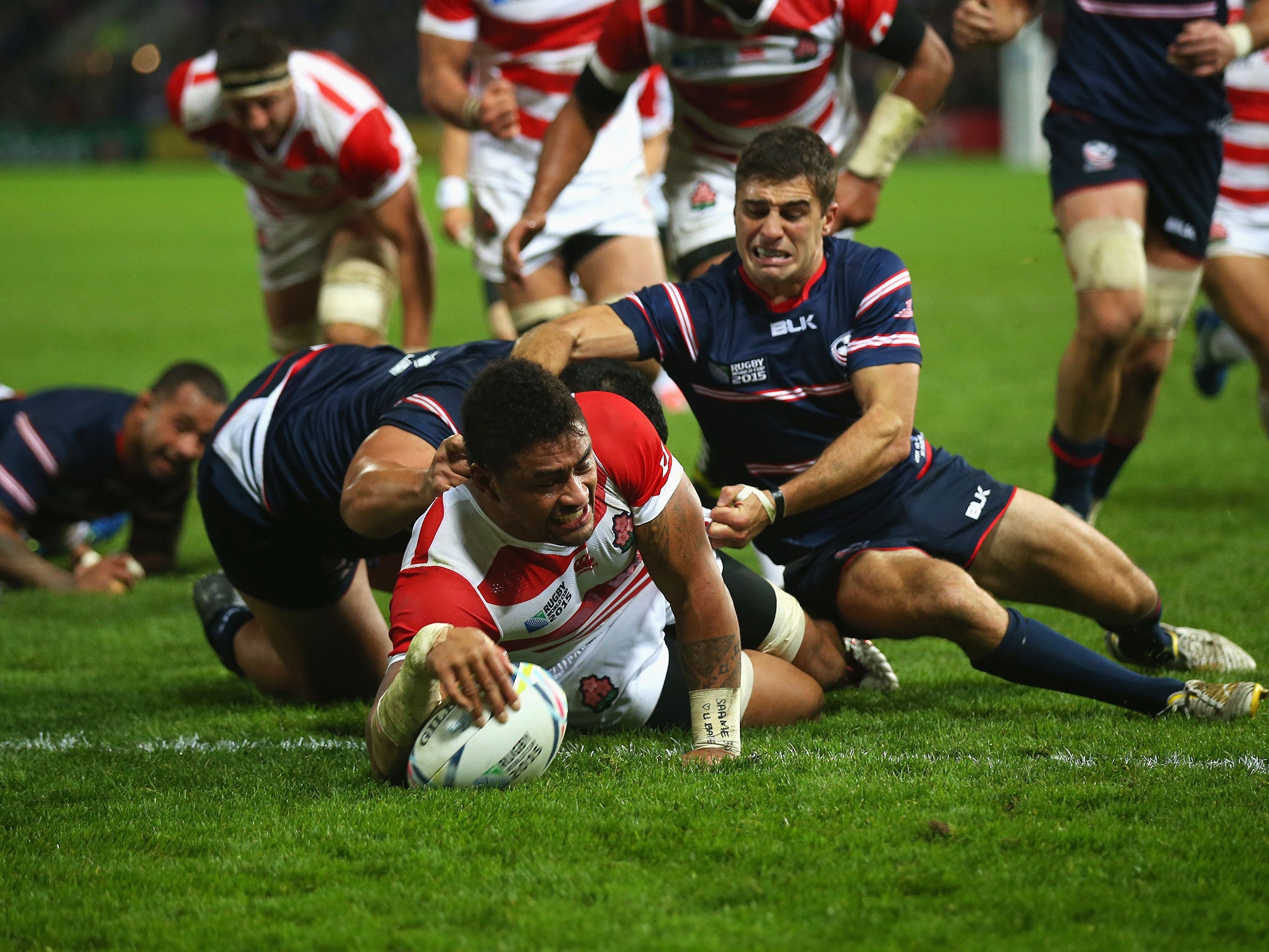 Amanaki Mafi stretches out to score a try for Japan against USA