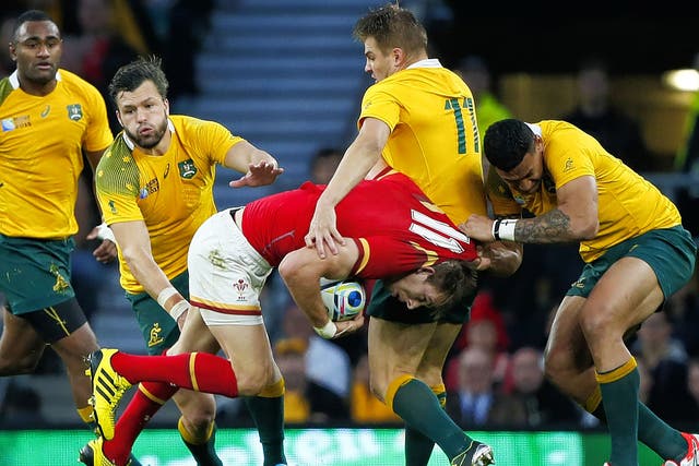 Wales back Liam Williams is stopped in his tracks by the Australia defence on Saturday