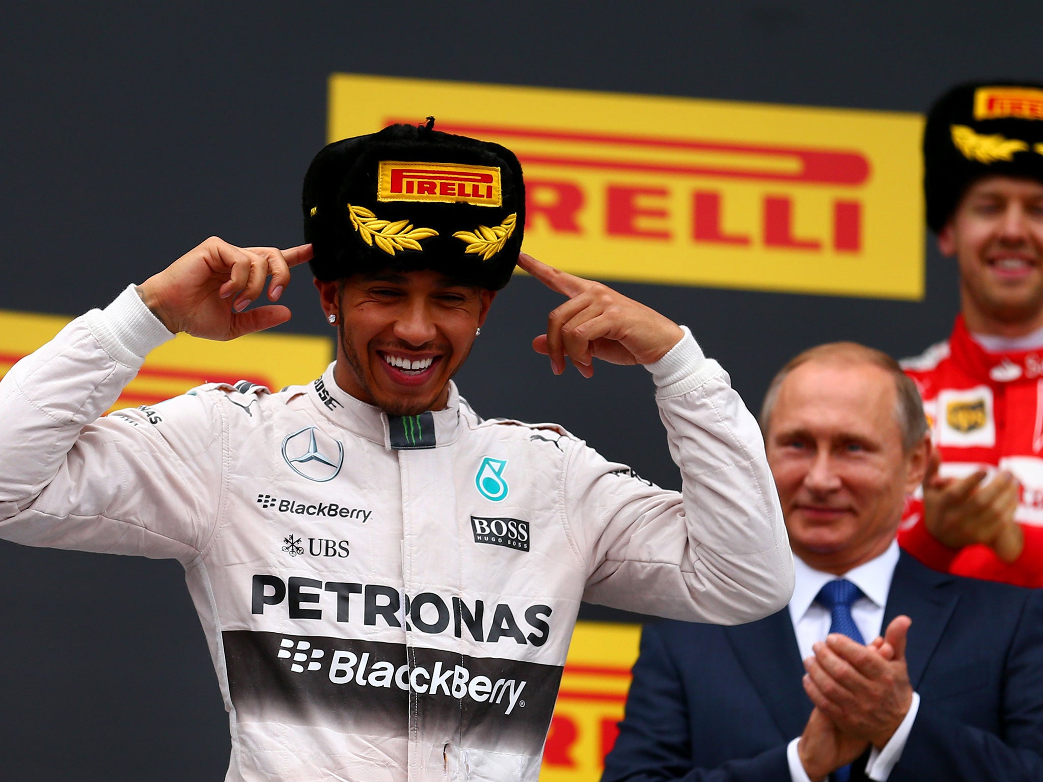 Lewis Hamilton sports a special Russian-themed Pirelli hat after winning in Sochi