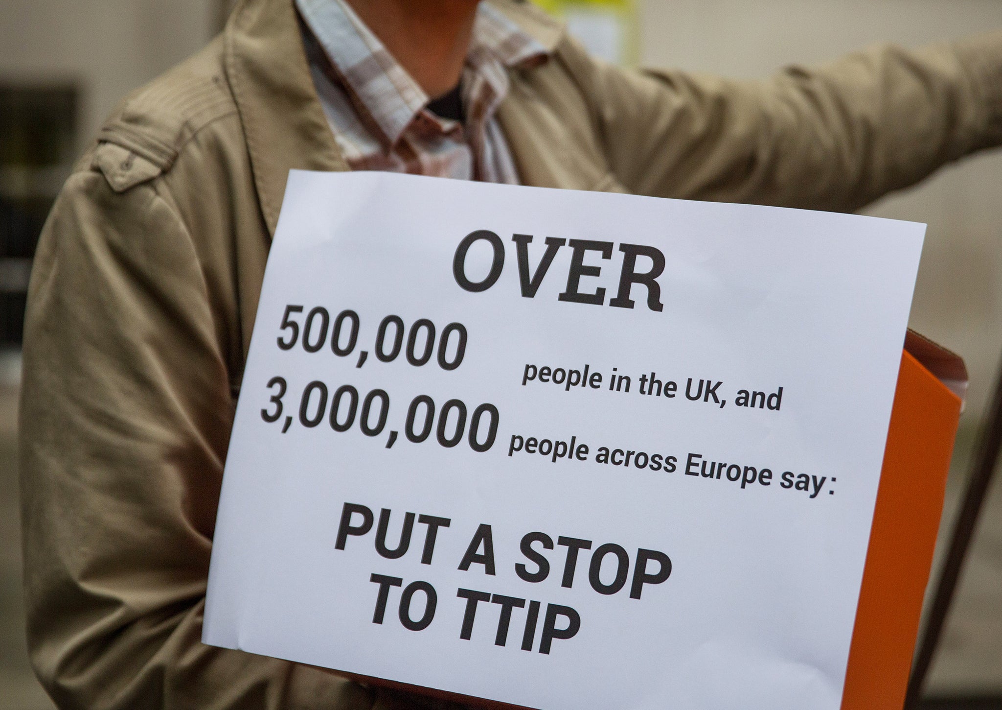 Campaigners against TTIP gather outside the European Commission in London, 7 October 2015