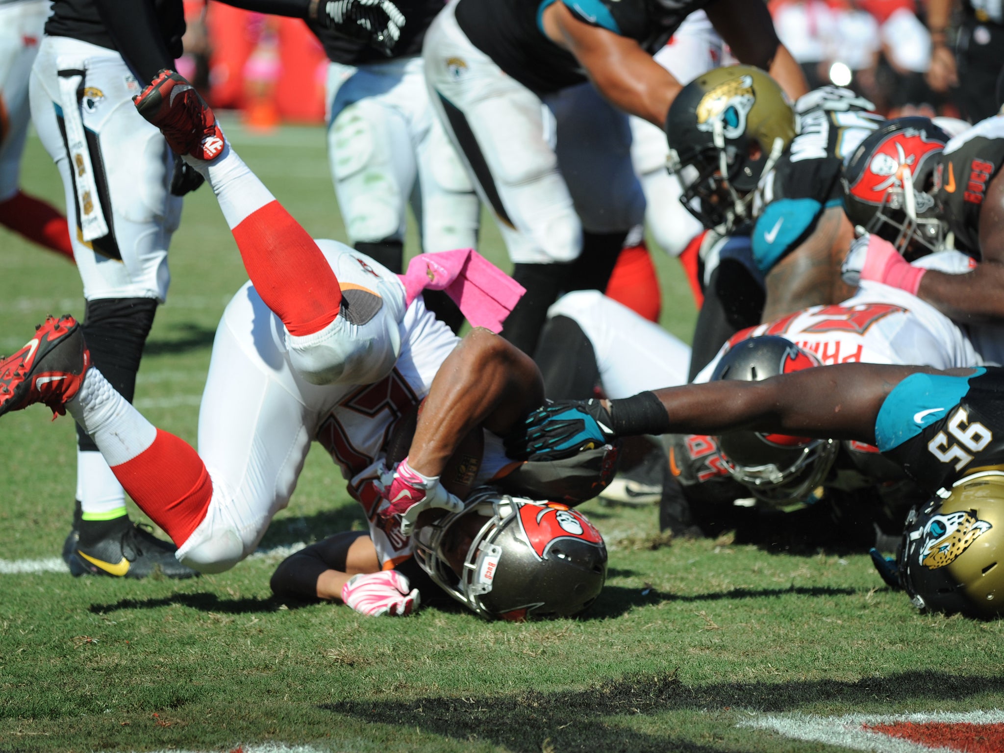 Doug Martin ran for 123 yards as the Jaguars lost 38-31