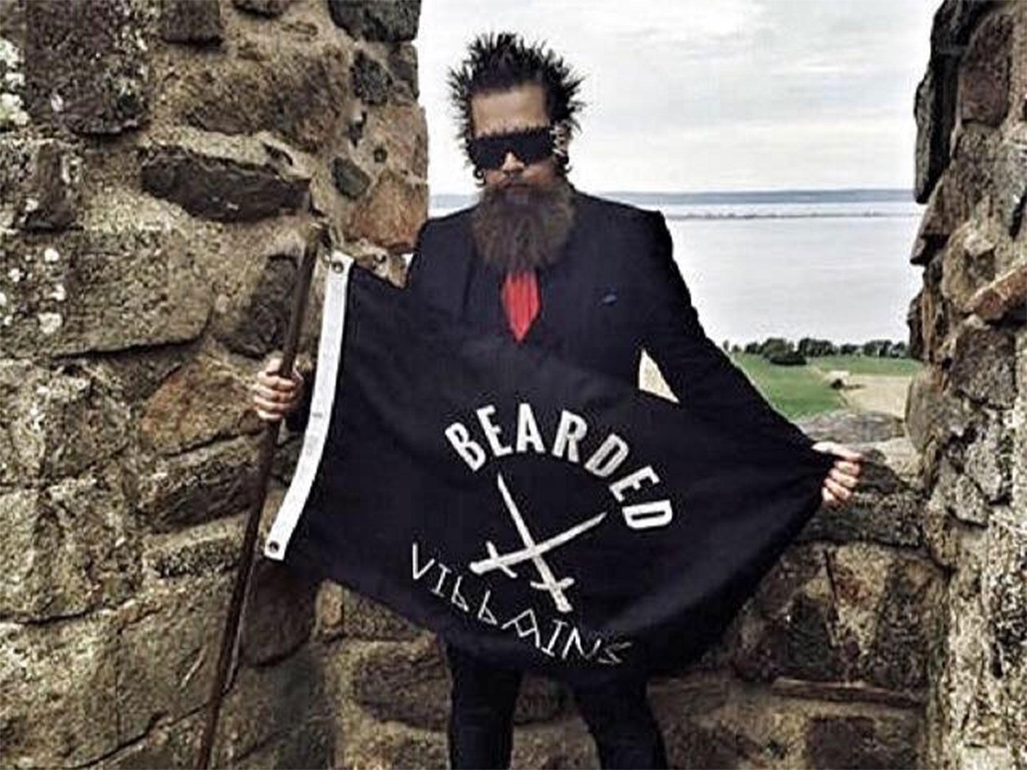 Bearded Villains member Andreas Fransson pictured with the group's flag