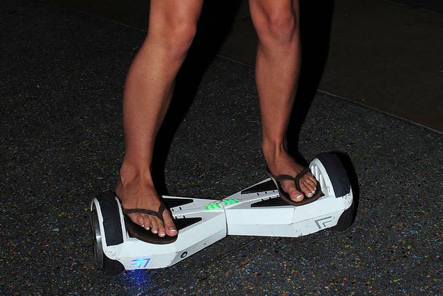 Janelle Evans riding on a Watch Me Hover Hoverboard in Los Angeles