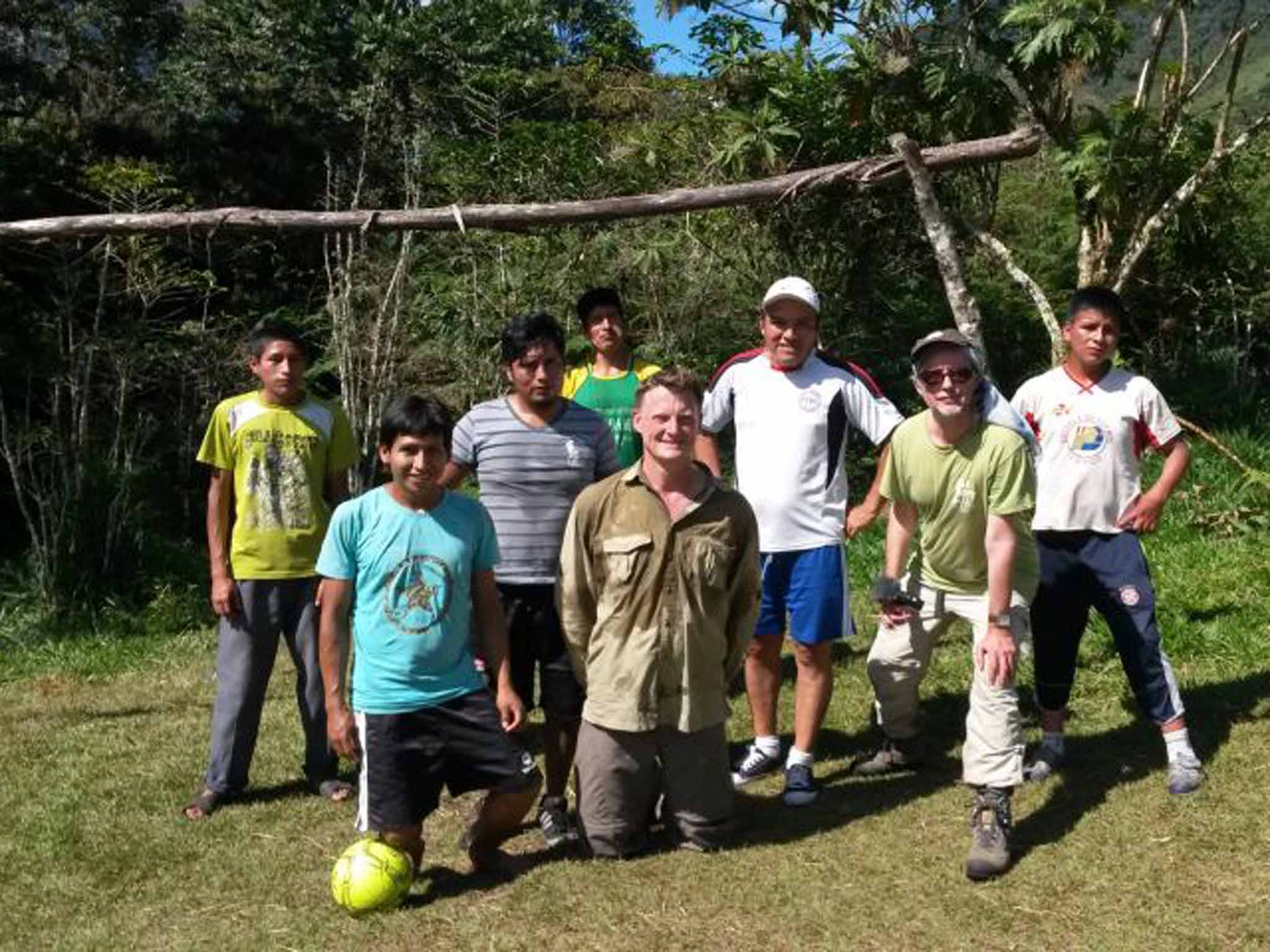 &#13;
The travellers pause for a game of football with local men Hugh Thomson&#13;