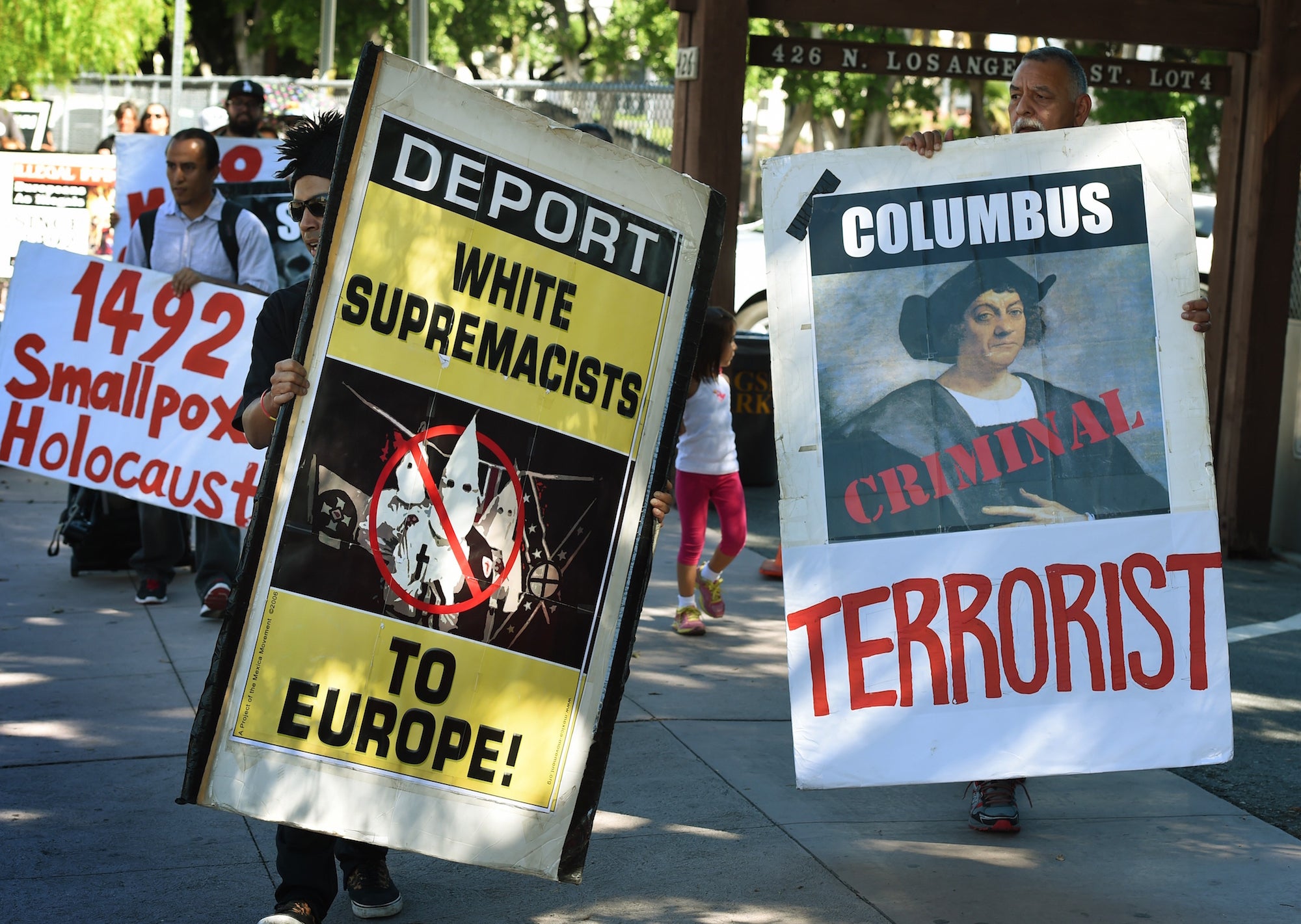 Demonstrators protest Columbus Day in Los Angeles.