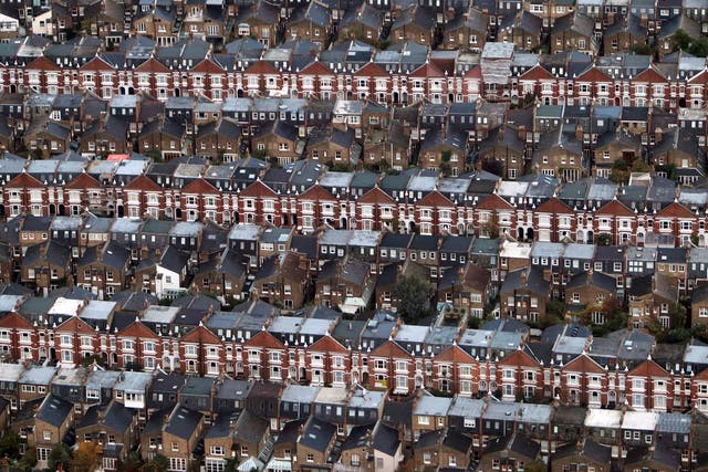 An aerial view of rows of terraced housing in London