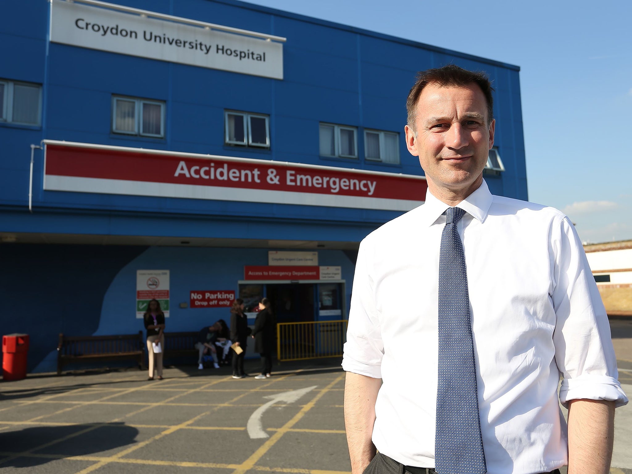 Jeremy Hunt on a visit to Croydon University Hospital earlier this year. The Health Secretary has been urged to guarantee that doctors will not have their pay cut