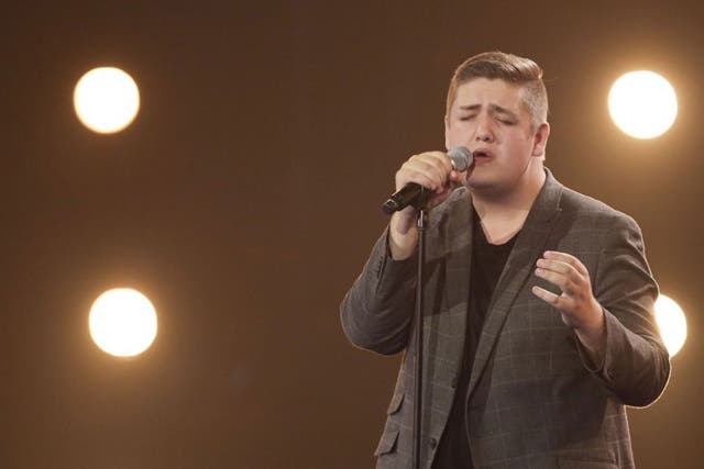 Tom Bleasby performing on the X Factor