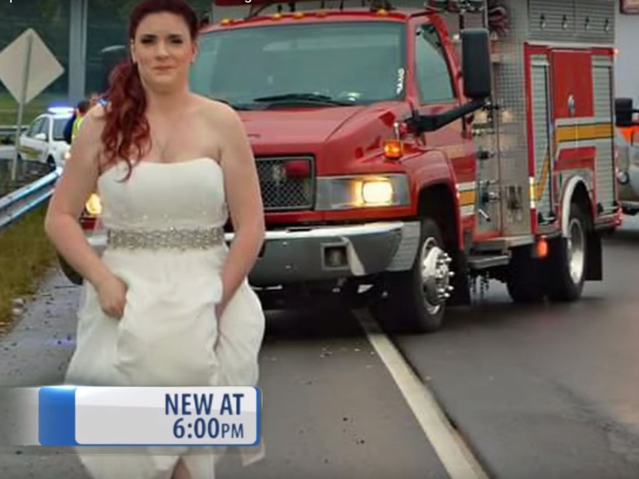 Sarah Ray walks away from the crash scene two miles from where she just got married