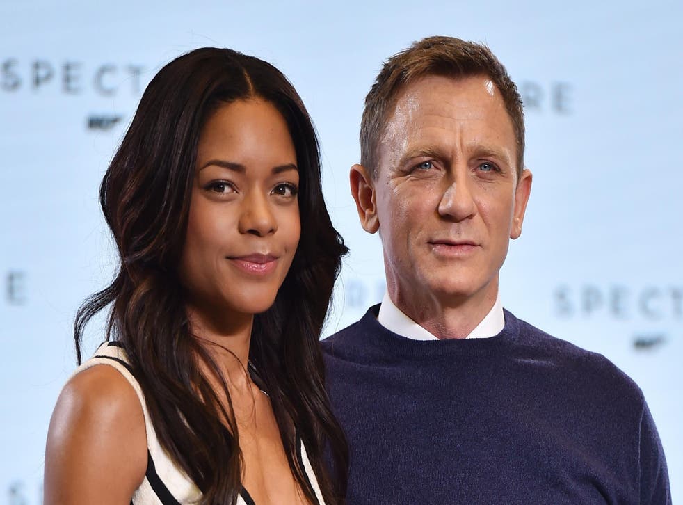Naomi Harris and Daniel Craig pose during an event to launch the 24th James Bond film 'Spectre' at Pinewood Studios