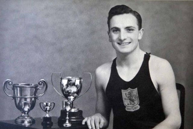 Heatly in 1942 with some of his trophies: 'I would like to have had what Tom Daley has now!' he joked in later life (PA)