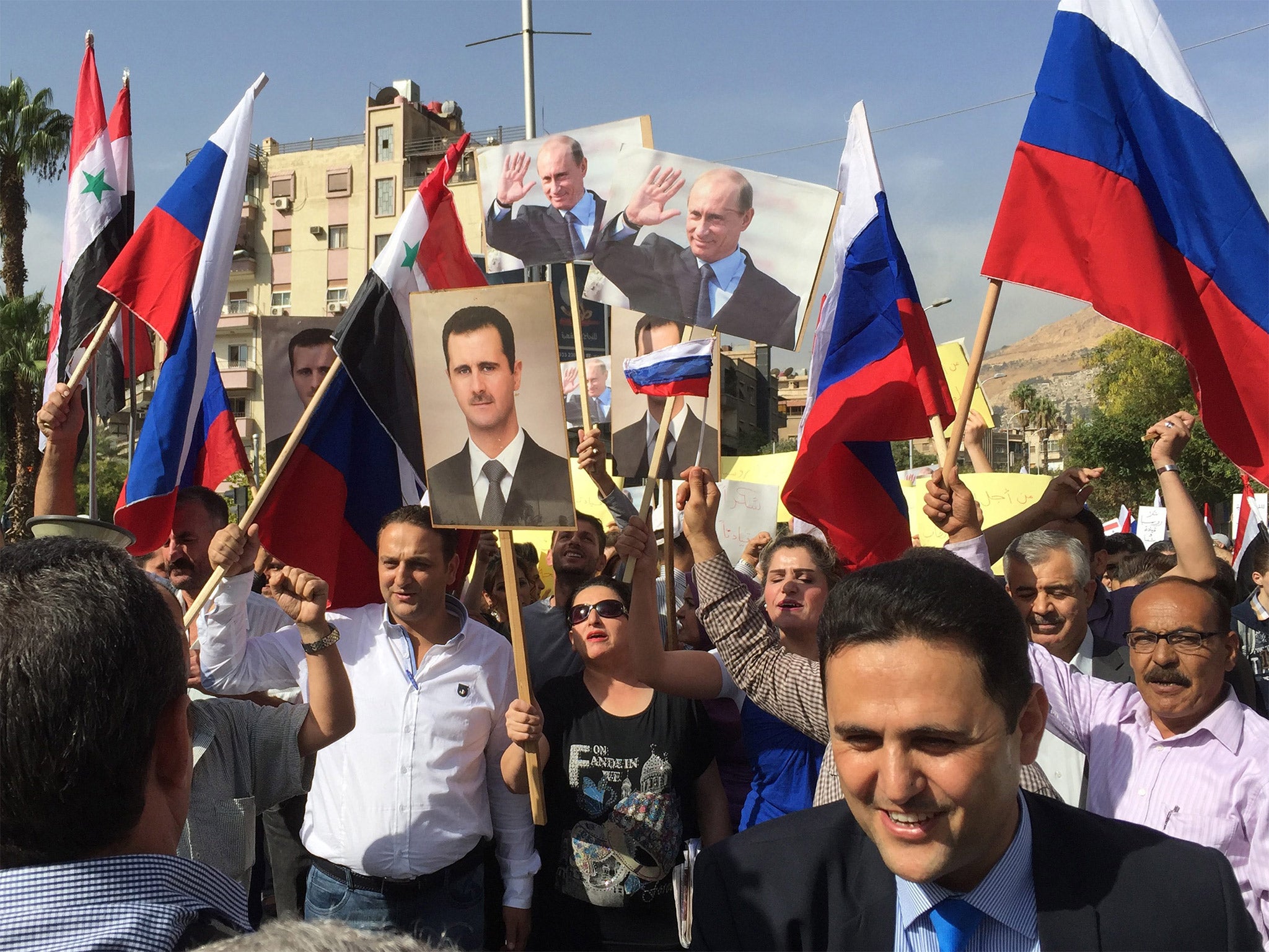 Syrians gather in front of the Russian embassy to thank Russia for its military intervention
