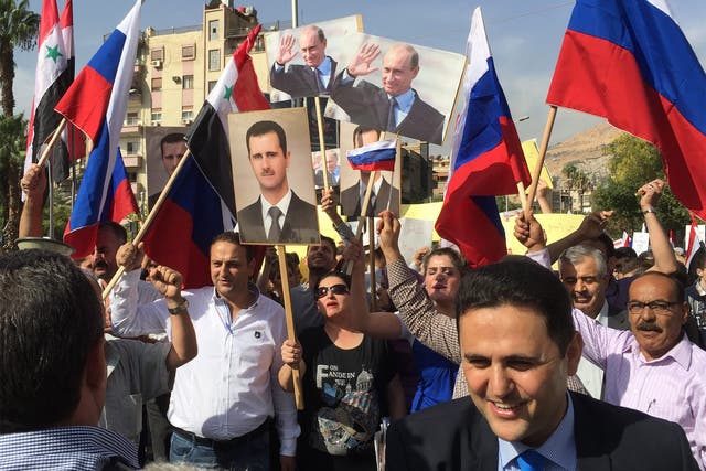 Syrians gather in front of the Russian embassy to thank Russia for its military intervention