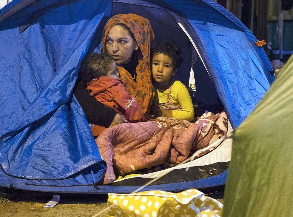 A Syrian family at a refugee camp in northern France