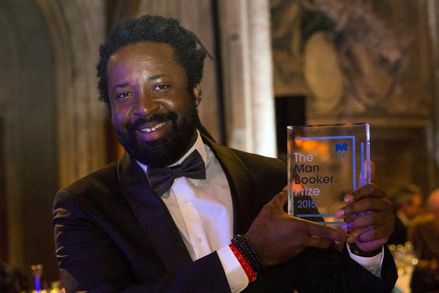 Author Marlon James winning author of "A Brief History of Seven Killings", poses with his award  at the ceremony for the Man Booker Prize for Fiction 2015 at The Guildhall  in London