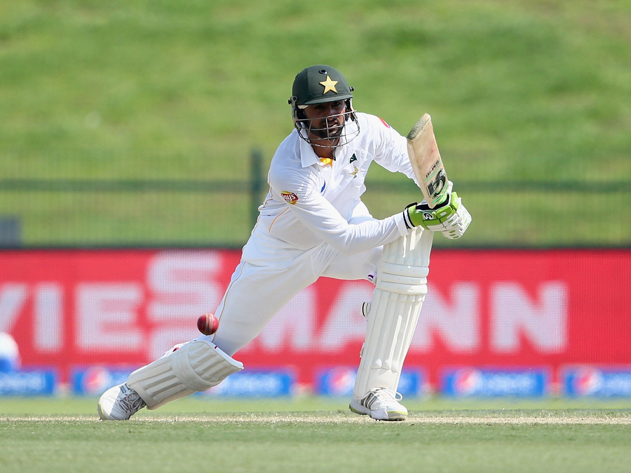 Shoaib drives a shot through the field on the second morning of the First Test