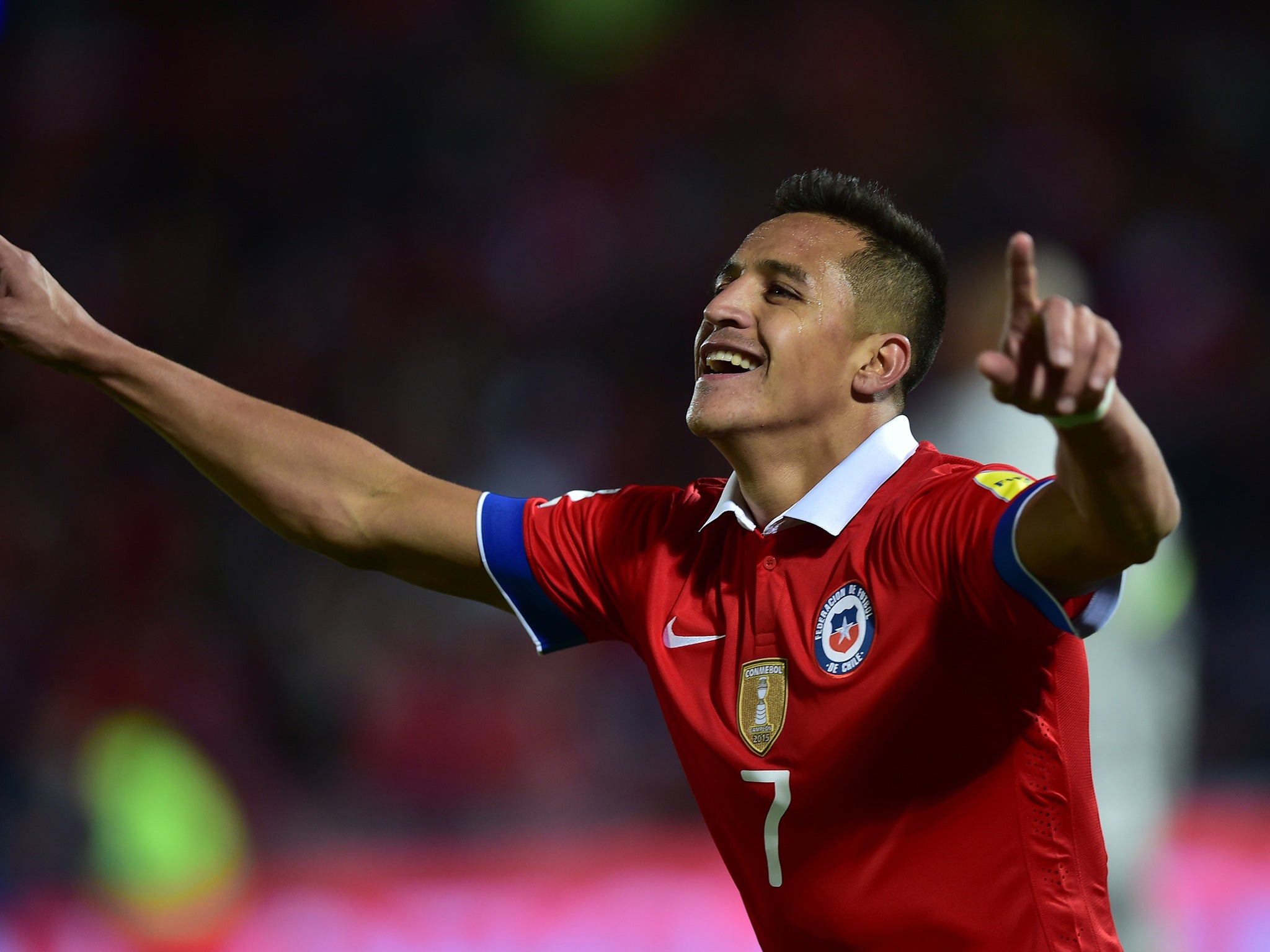 Alexis Sanchez celebrates scoring for Chile