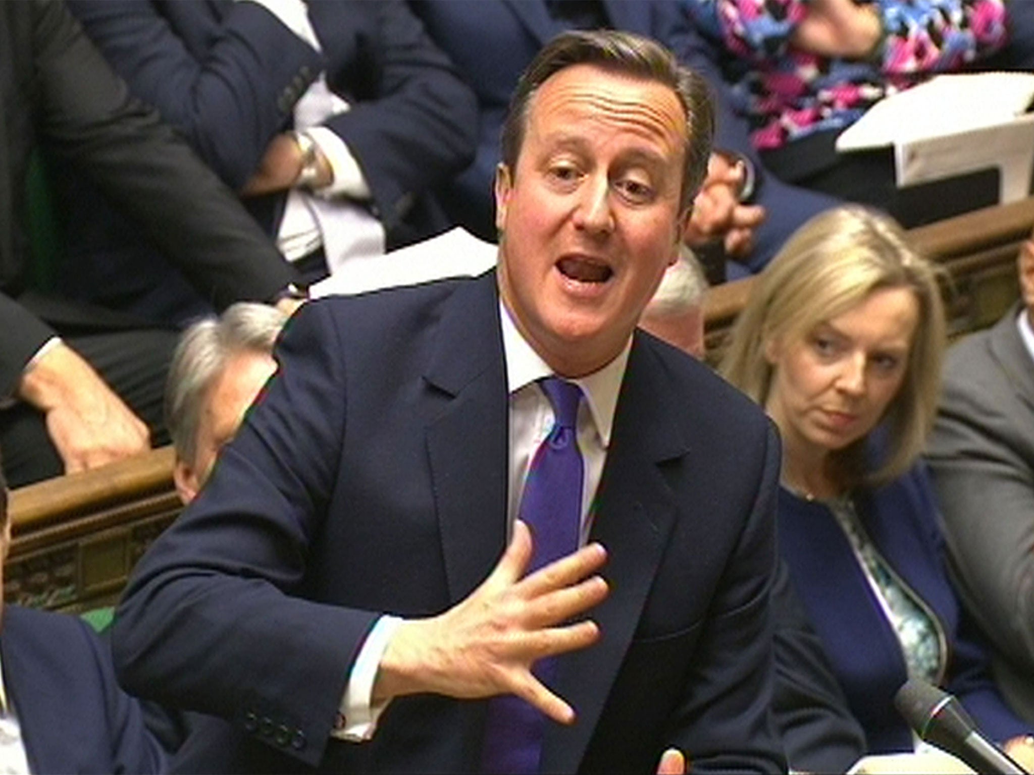 &#13;
David Cameron is under pressure from Labour to scrap the cuts to tax credits&#13;