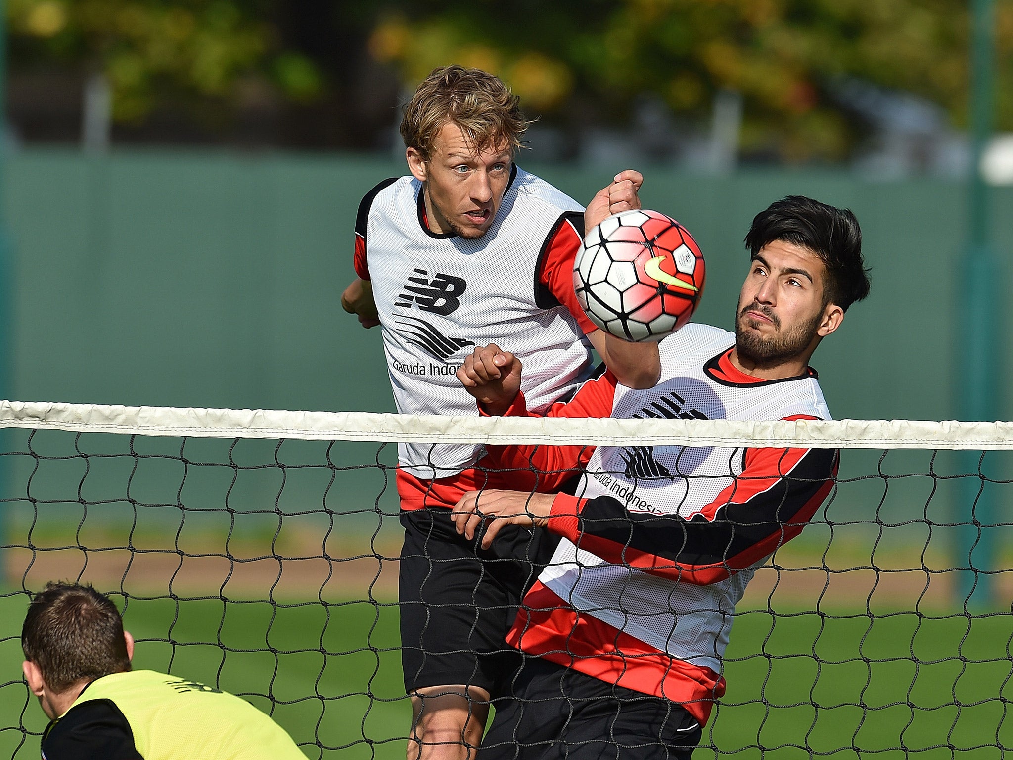 Lucas, left, challenges Emre Can for the ball in a training session earlier this season