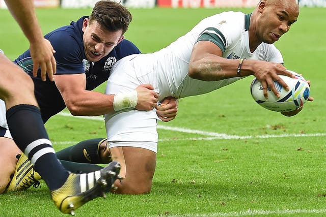 J P Pietersen scores a try in the 34-16 win against Scotland
