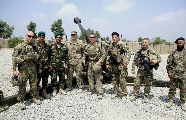 US and Afghan forces pose in Afghanistan