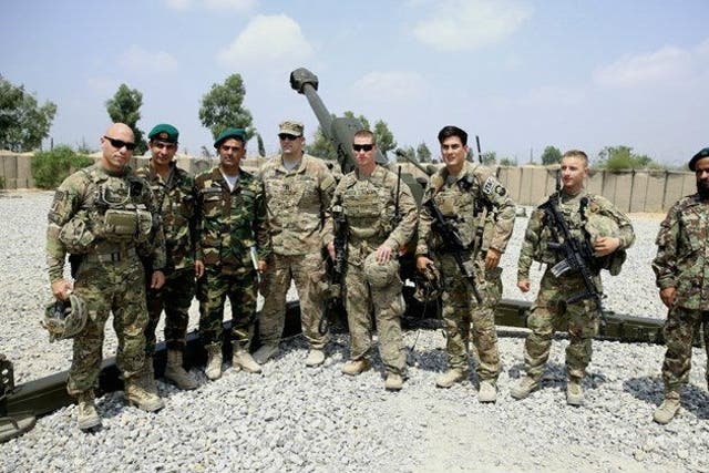 US and Afghan forces pose in Afghanistan