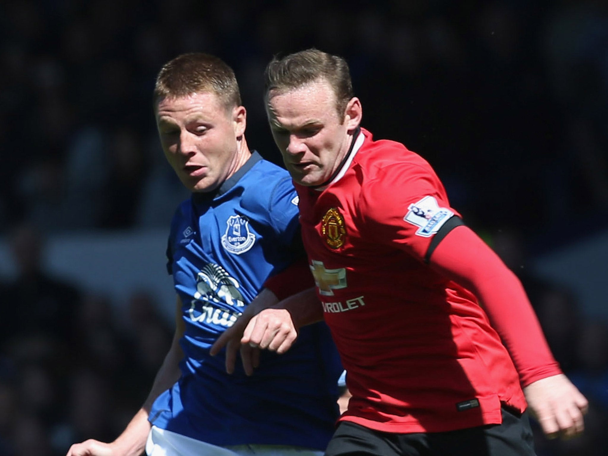 Wayne Rooney and James McCarthy fight for the ball at Goodison Park last season