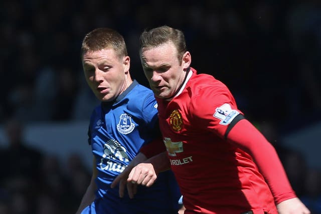 Wayne Rooney and James McCarthy fight for the ball at Goodison Park last season