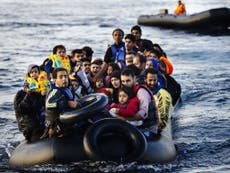 8 missing after refugee boat hits rescue vessel off Greek coast