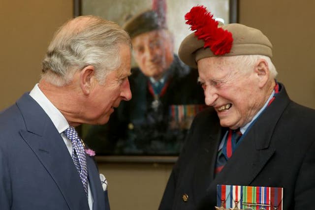 Stewart and Prince Charles in front of his portrait by Paul Benney at the D-Day Veterans exhibition ‘The Last Of The Tide’ at The Queen’s Gallery in London in June this year