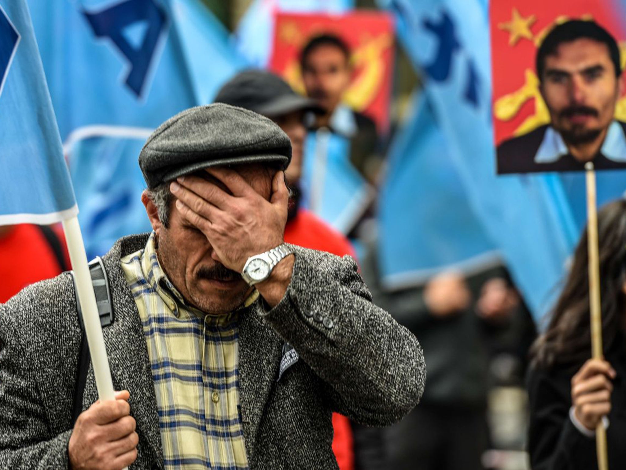 A mourner at the funeral of Serdar Ben, a victim of last weekend’s bombings in Turkey