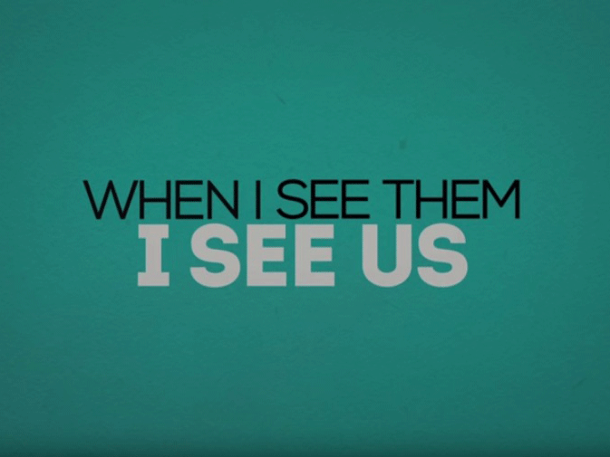 The video has the slogan 'when I see them I see us'